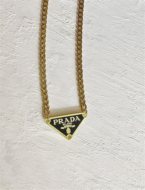 prada black and gold necklace|prada necklace price.